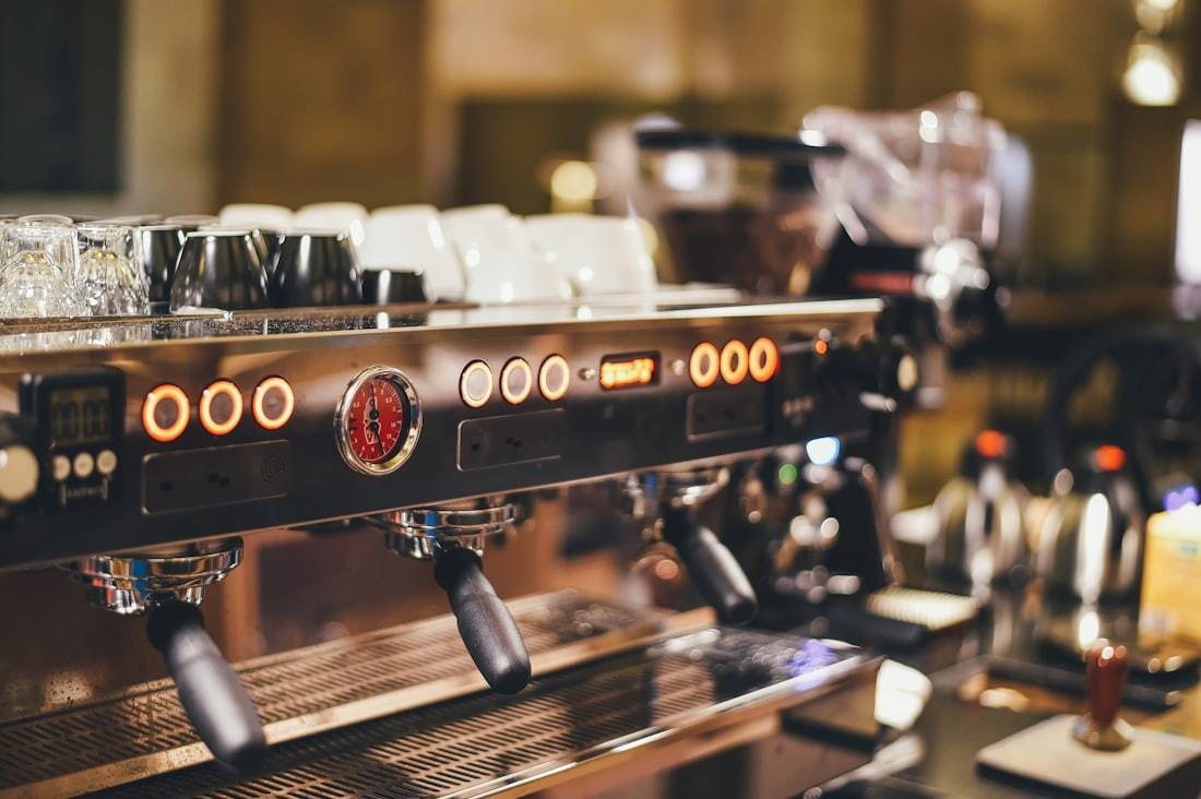 Espresso machine with portafilters at the coffee bar